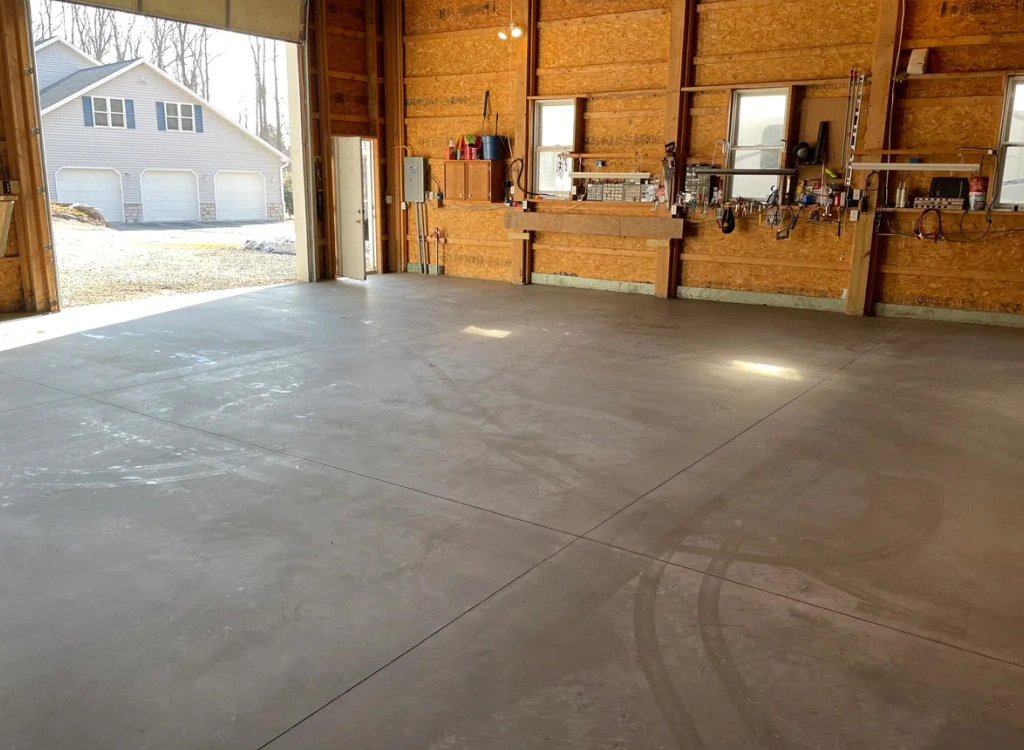 driveways service newly installed concrete floor in a garage